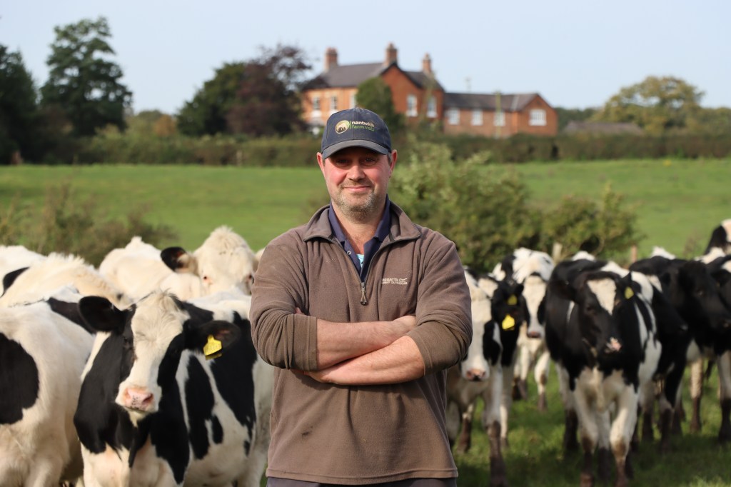 Stuart Symms with GMS heifers